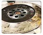 Burn marks on the flywheel, Heat spots on pressure plate/flywheel, Failure to resurface flywheel, Clutch facing completely worn, Clutch lining damaged.
